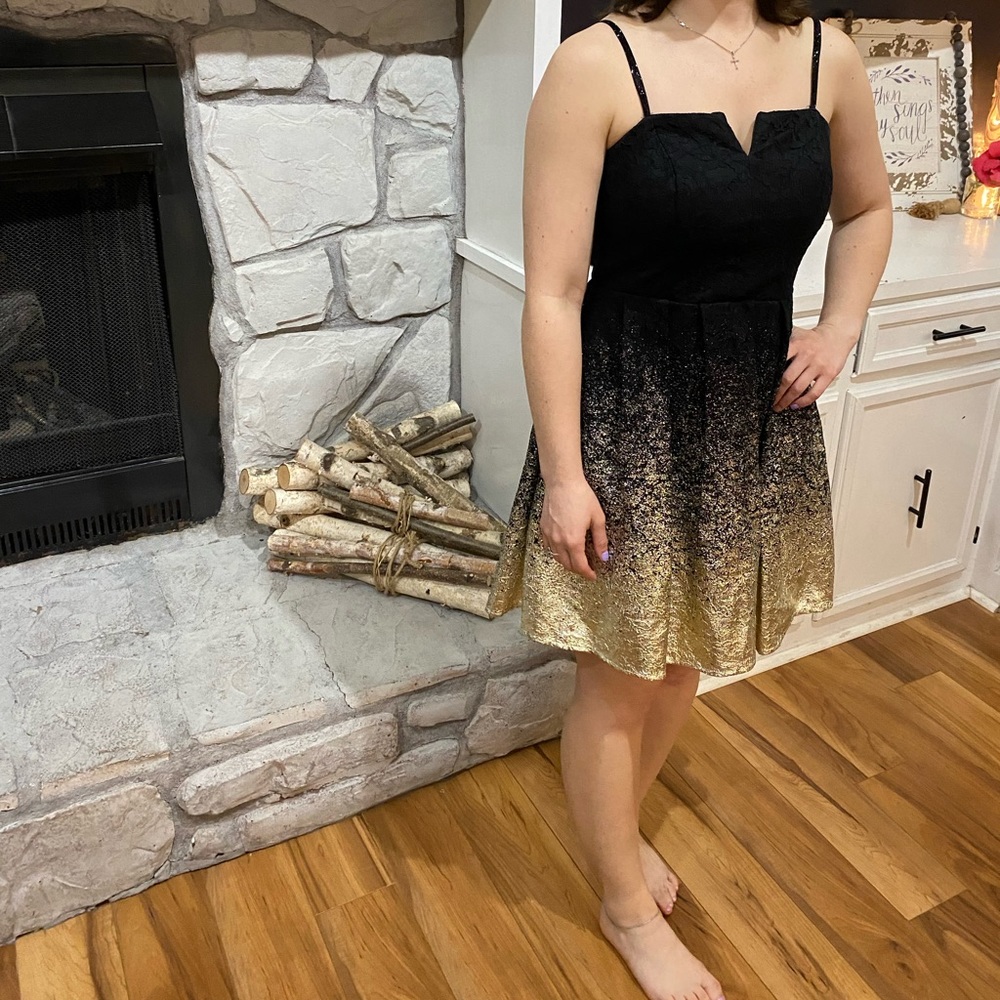 Junior High or High School dress for dance, above knee; black and gold